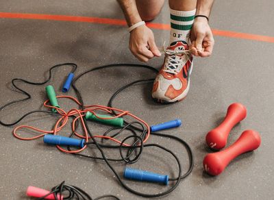 Close-up of athletic shoes on a gym floor, ready for workout.